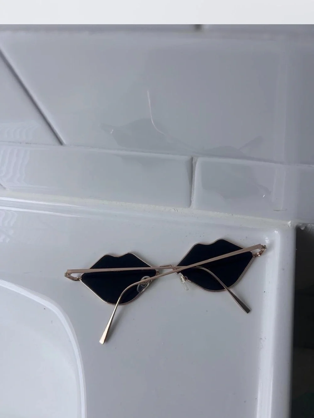Black and gold lip sunglasses